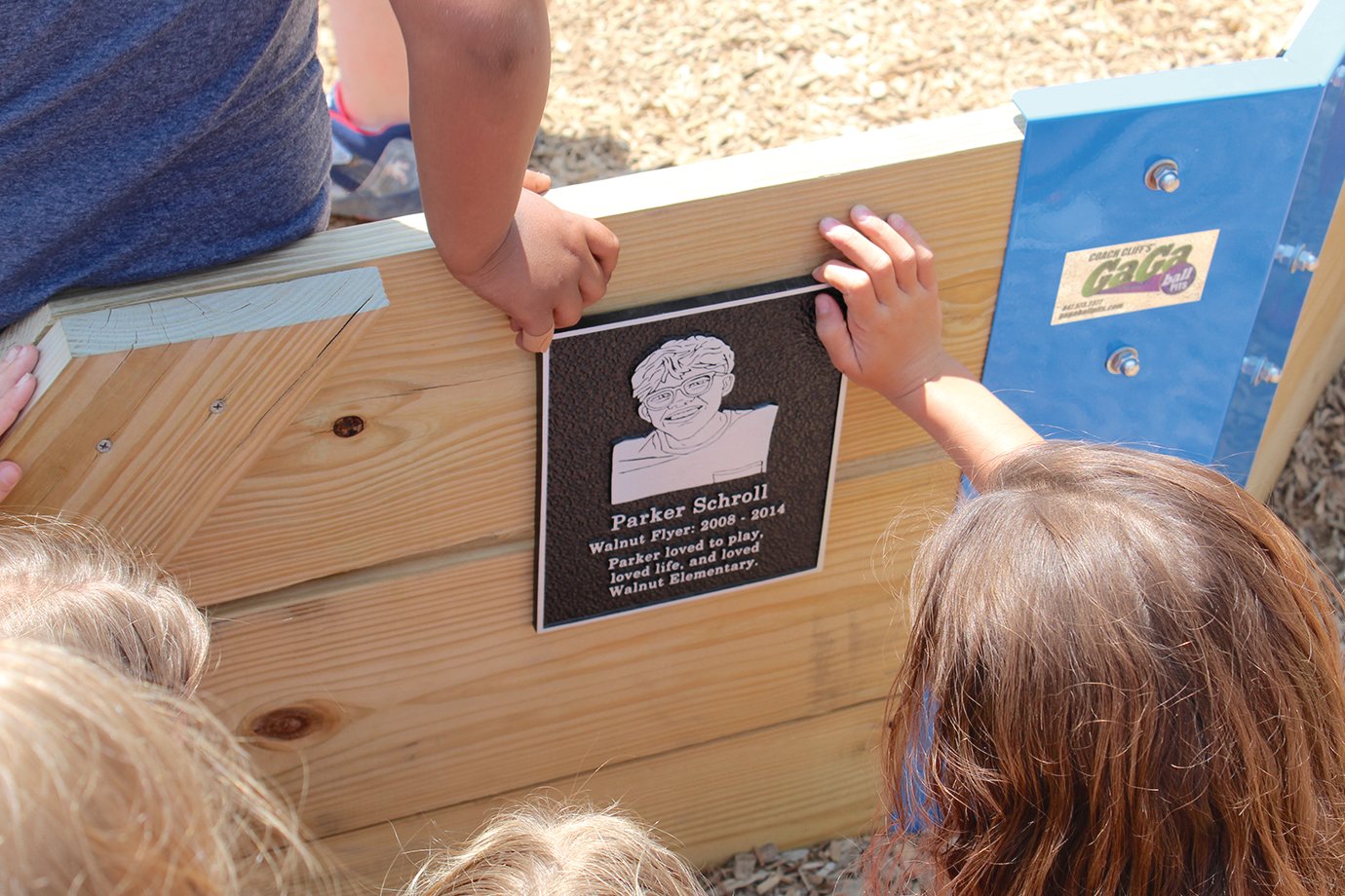 A plaque commemorating Parker Schroll adorns the newly installed Gaga Pit at Walnut Elementary.